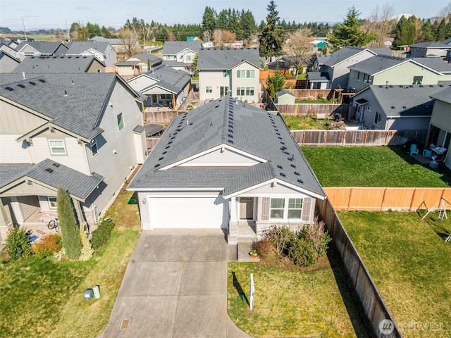 drone / aerial view with a residential view