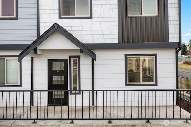 property entrance with fence