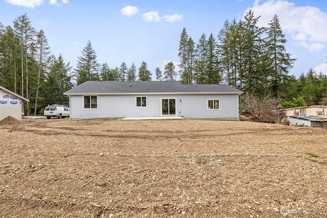 rear view of property with a patio area