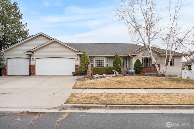 single story home with brick siding, a front lawn, roof with shingles, driveway, and an attached garage