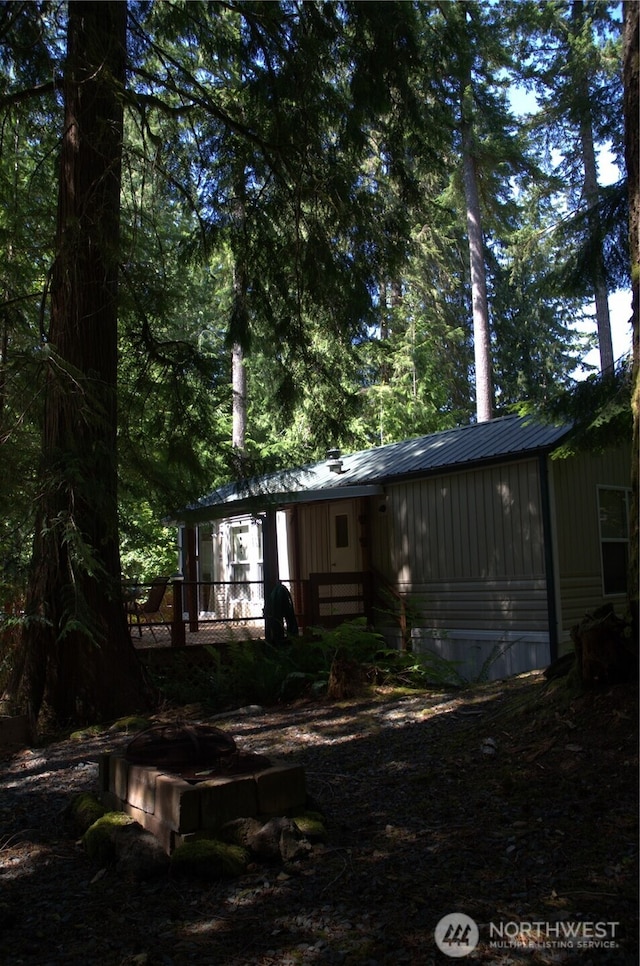 back of property with metal roof