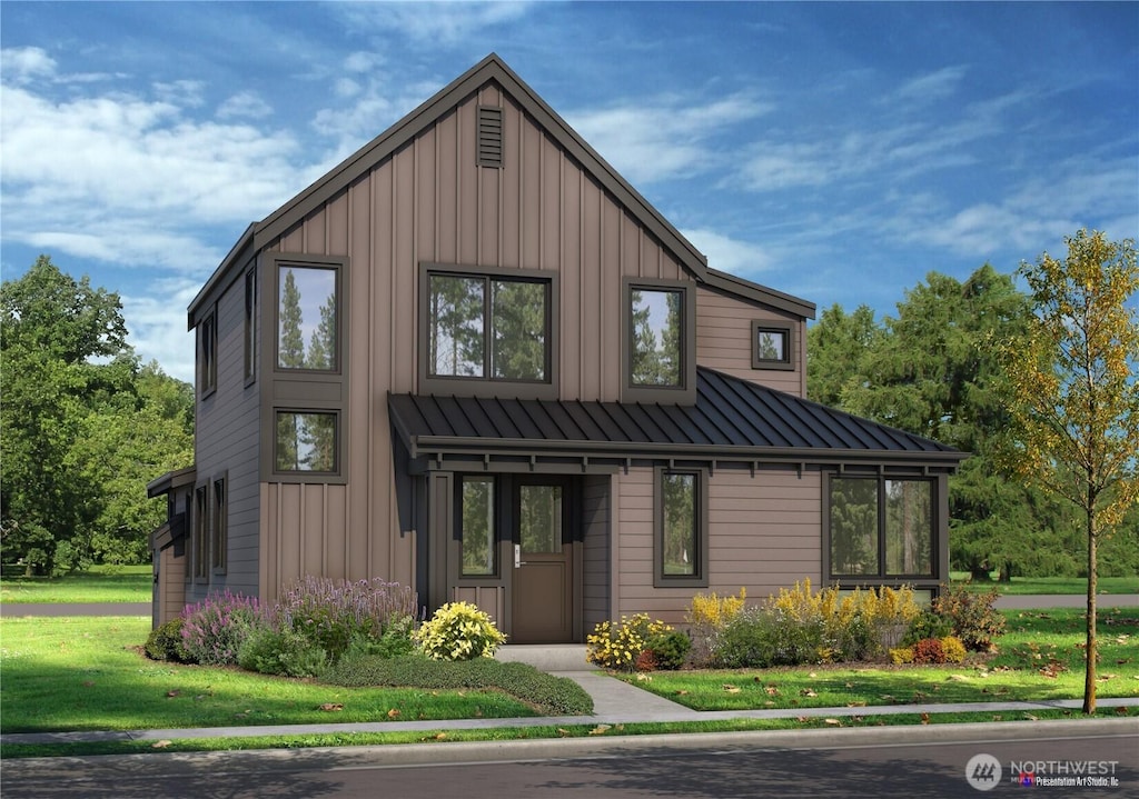 view of front facade with a standing seam roof, a front lawn, board and batten siding, and metal roof