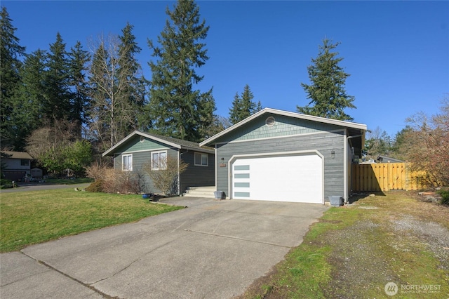 single story home with driveway, a front yard, a garage, and fence