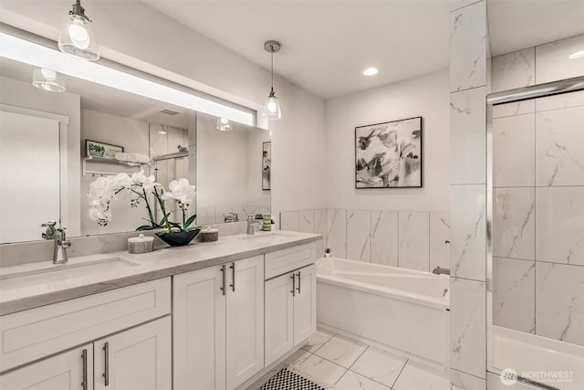 full bath featuring a sink, marble finish floor, a bath, and a shower stall