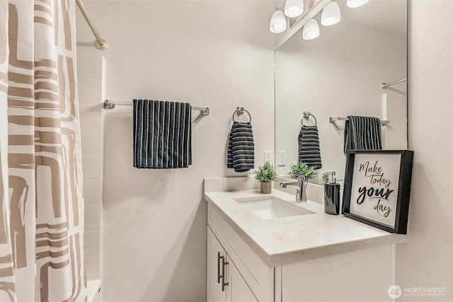 bathroom featuring vanity and shower / tub combo