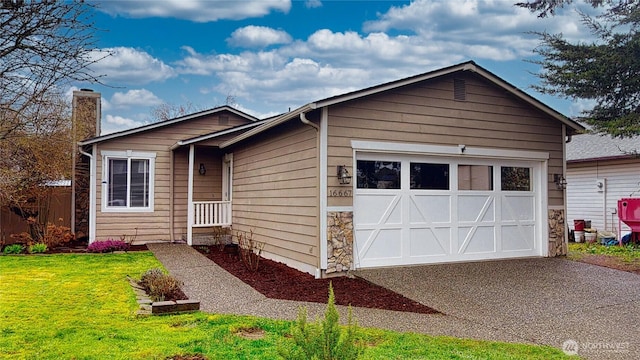 view of front of home featuring a front yard, an attached garage, a chimney, stone siding, and aphalt driveway