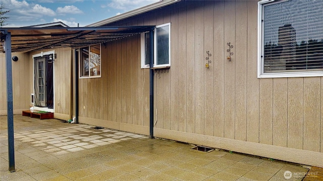 view of home's exterior with a patio area