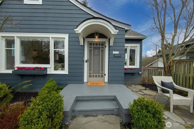 property entrance with fence