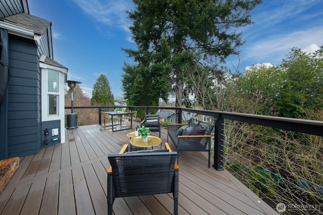 deck featuring an outdoor living space