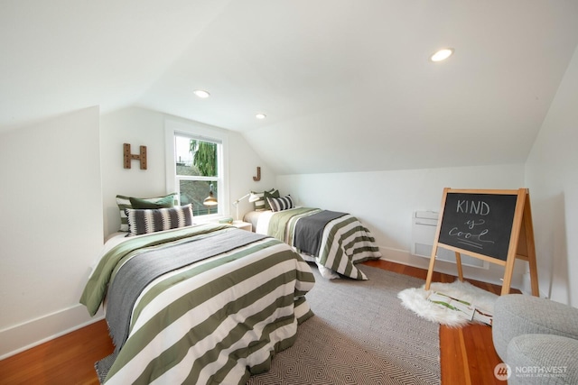 bedroom featuring recessed lighting, baseboards, wood finished floors, and vaulted ceiling