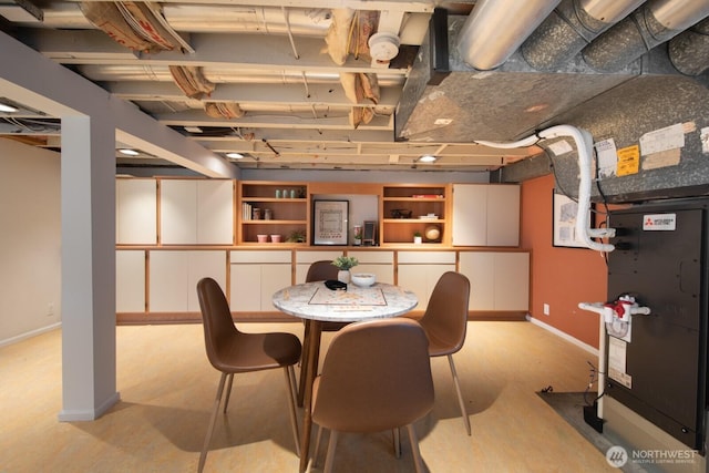 dining area featuring baseboards