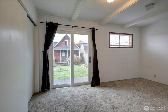 446 Eklund Ave, Hoquiam, WA 98550 - empty room with carpet and beam ceiling