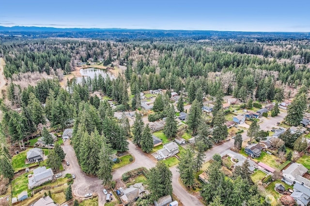 aerial view featuring a forest view