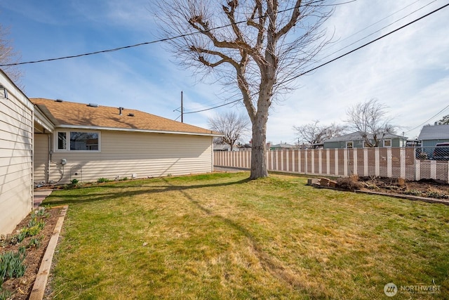 view of yard featuring fence