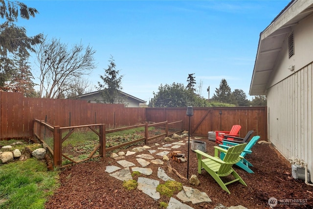 view of yard featuring a fenced backyard