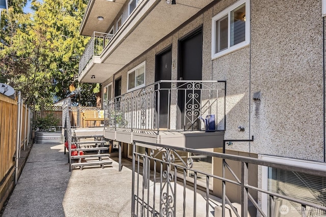 view of patio / terrace featuring fence