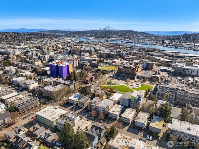 bird's eye view with a city view and a water view