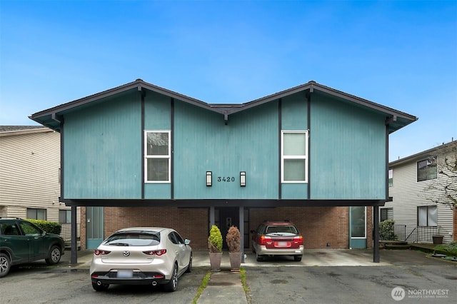 view of front of property featuring brick siding