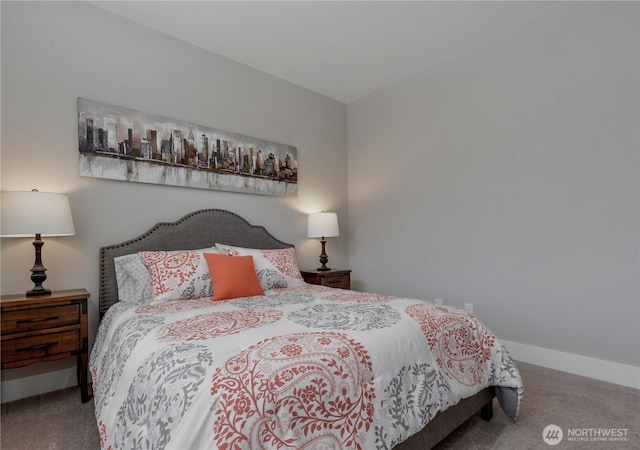 carpeted bedroom with baseboards