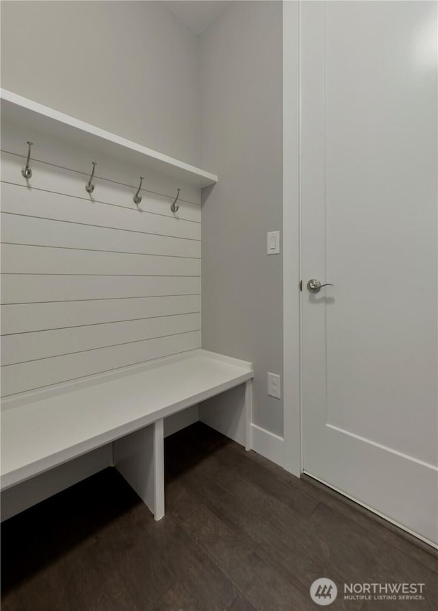 mudroom with dark wood-style floors