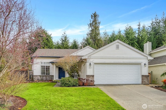 single story home featuring a garage, driveway, brick siding, and a front yard