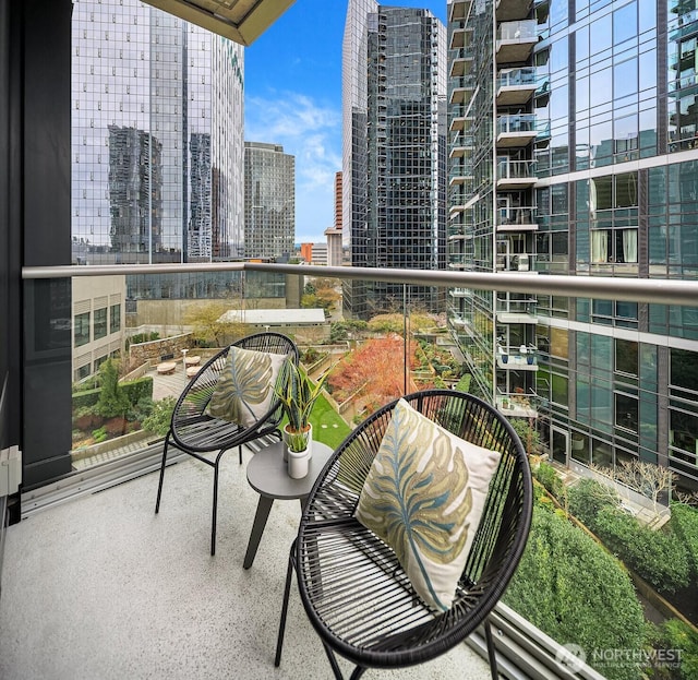 balcony featuring a view of city