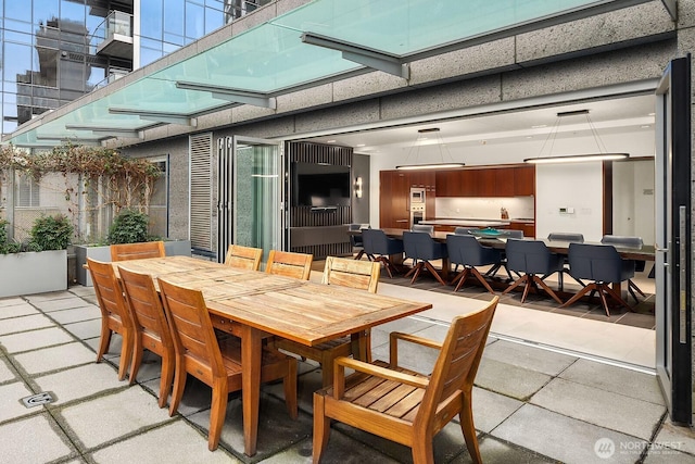 view of patio with outdoor dining area