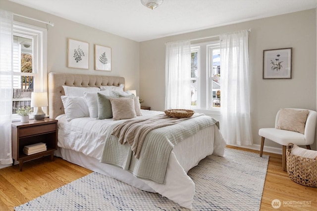 bedroom with light wood-style flooring