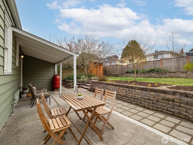 view of patio featuring a fenced backyard