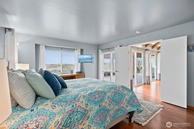 bedroom with wood finished floors