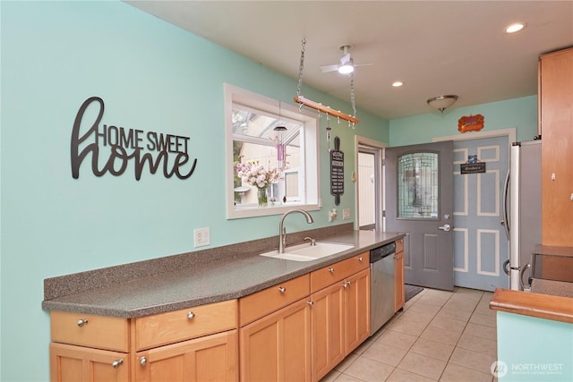 kitchen featuring ceiling fan, light tile patterned floors, recessed lighting, stainless steel appliances, and a sink