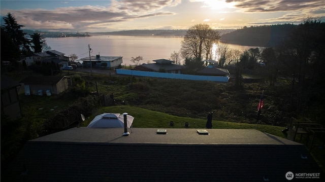 view of yard with a water view