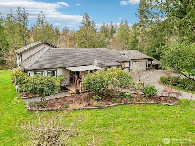 single story home with a garage, dirt driveway, roof with shingles, and a front lawn