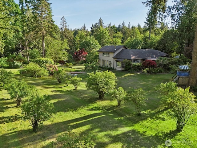 26821 NE 124th St, Duvall, WA 98019 - view of grassy yard with a view of trees