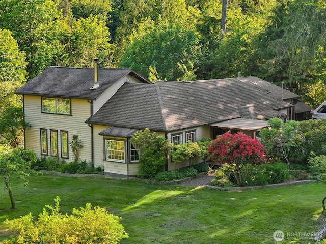 26821 NE 124th St, Duvall, WA 98019 - view of front of property with a front yard and roof with shingles