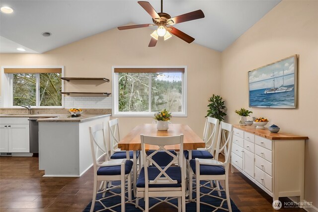 dining area featuring recessed lighting, a ceiling fan, dark wood-type flooring, and lofted ceiling