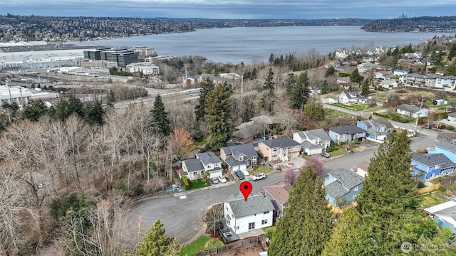 aerial view with a water view and a residential view