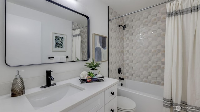 full bathroom with toilet, vanity, and shower / tub combo with curtain