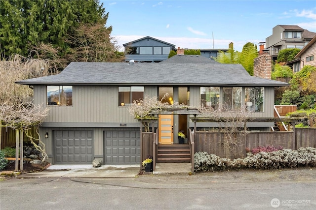 view of front of property with driveway and an attached garage