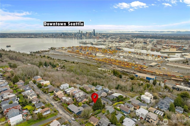 birds eye view of property featuring a water view