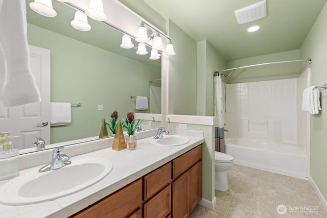 bathroom featuring a sink, visible vents, shower / bath combo with shower curtain, and double vanity