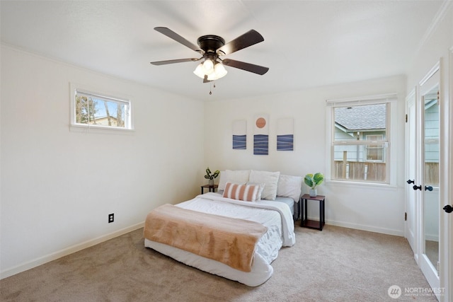 bedroom featuring carpet flooring, ceiling fan, and baseboards