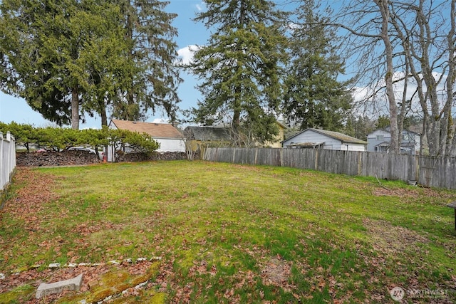 view of yard with fence