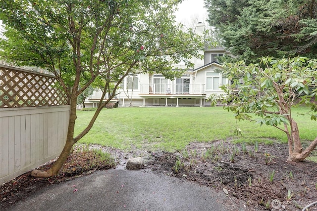 view of yard featuring fence