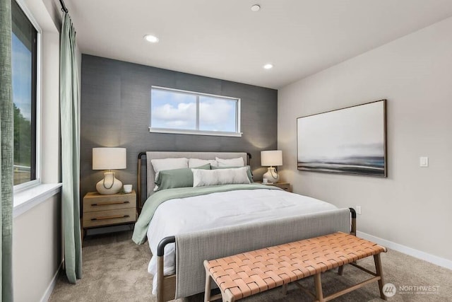 bedroom with recessed lighting, baseboards, and carpet floors