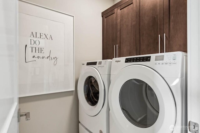 laundry area featuring cabinet space and independent washer and dryer