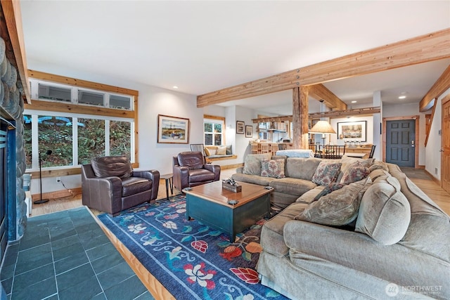 living room with beamed ceiling and recessed lighting