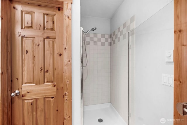 bathroom featuring a stall shower