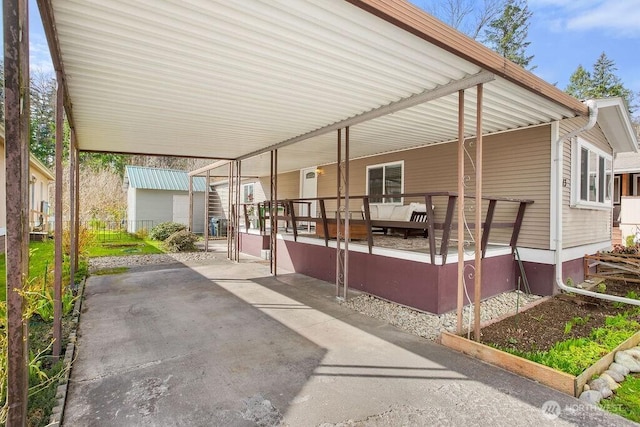 view of patio / terrace featuring a carport