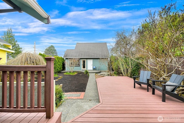 deck with an outbuilding